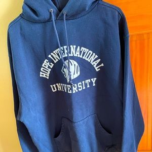 Unisex/women’s navy sweatshirt with printed front. Size XL. Hooded, long sleeve
